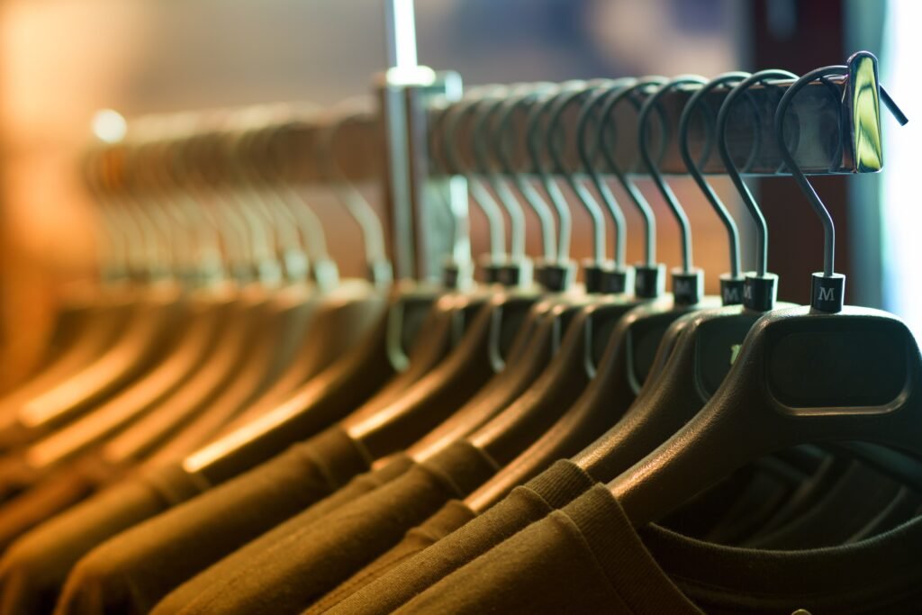 close-up stock photo of T-shirts on a clothing rack